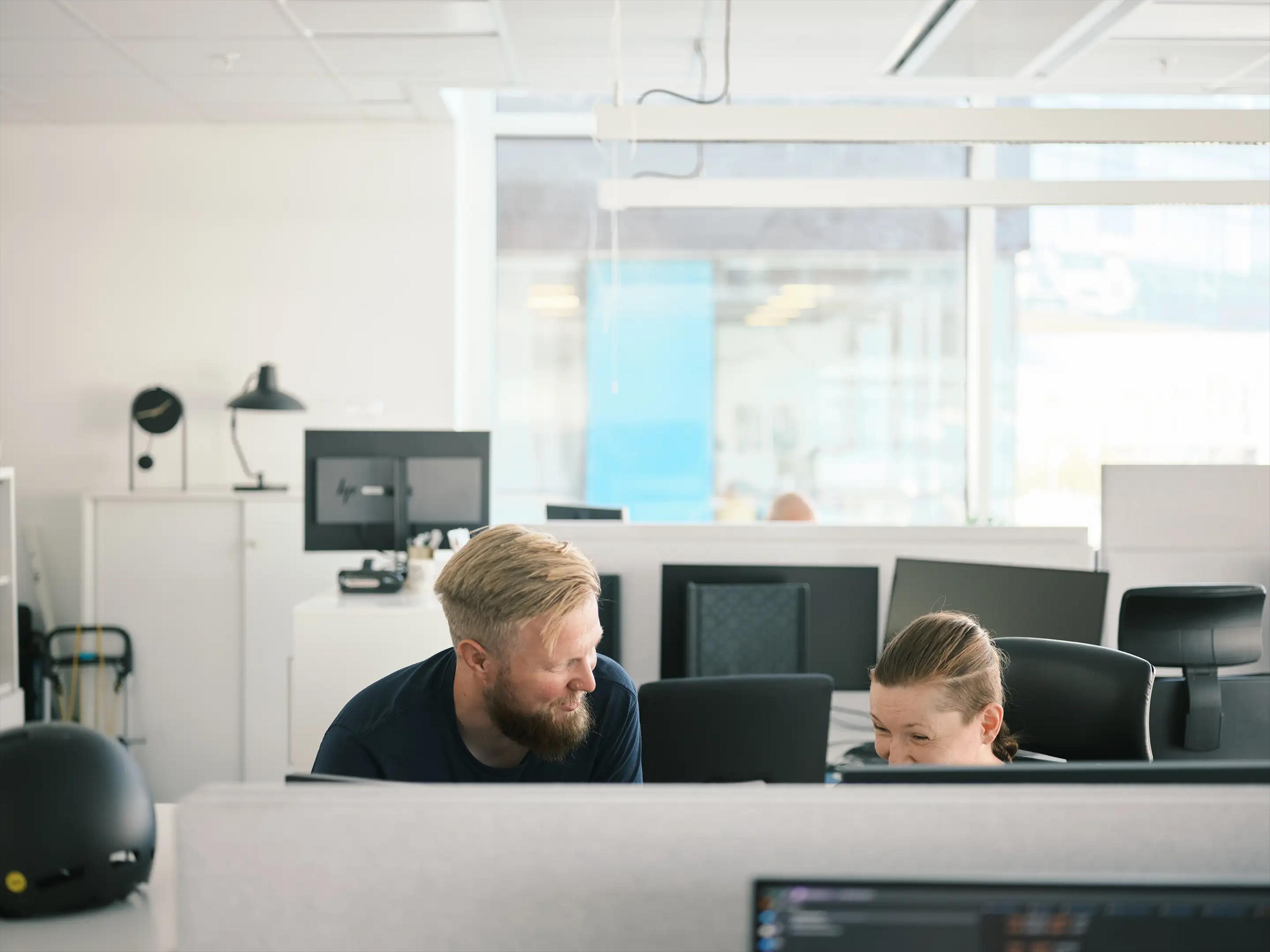 Two people working